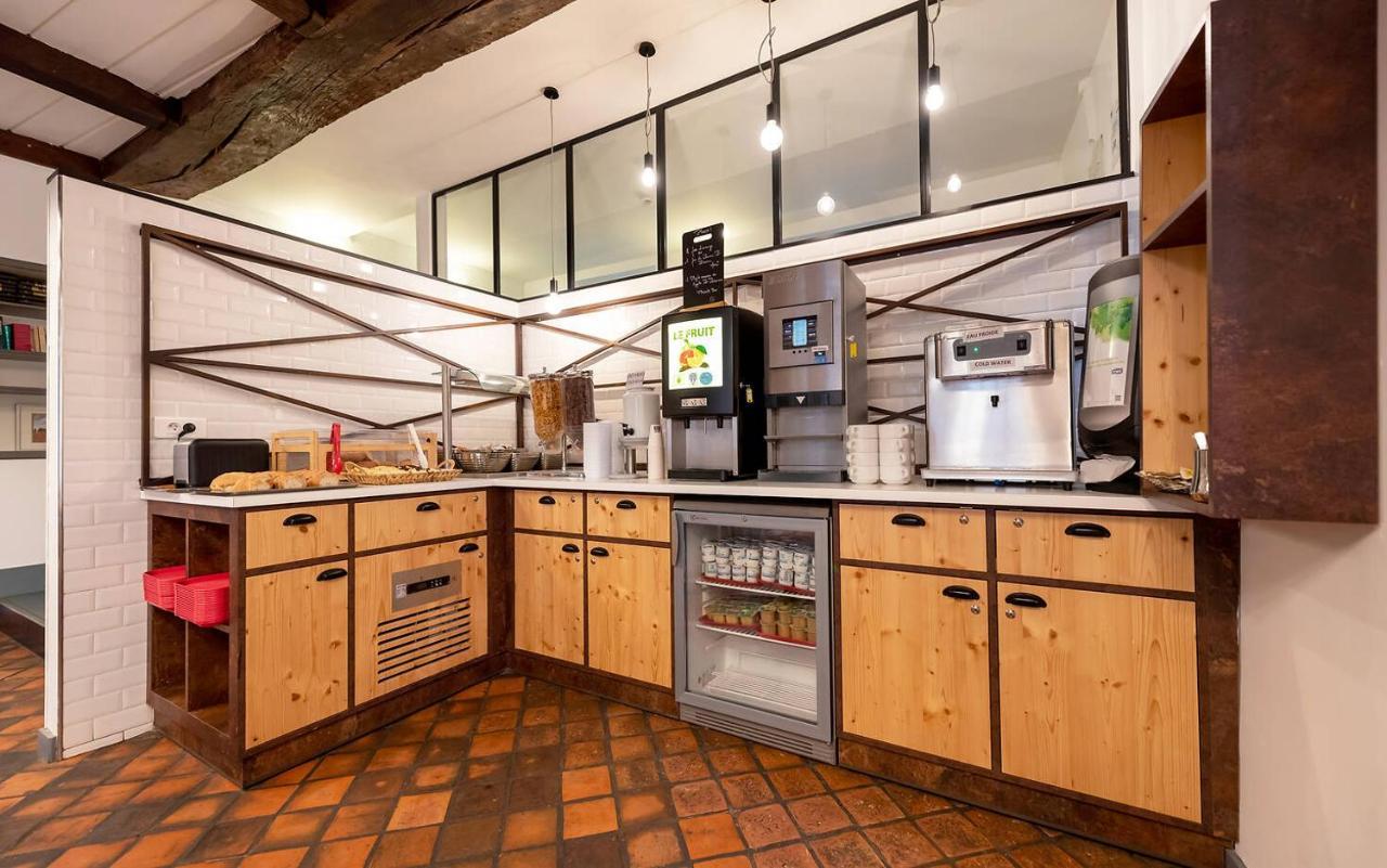 Mije Marais Hostel Париж Екстер'єр фото A typical coffee bar
